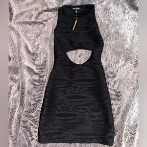 Pretty little thing Black textured cut out mini dress size 0. fits more like 00